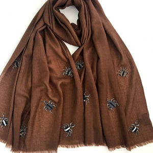 hand beaded bugs on merino wool shawl brown